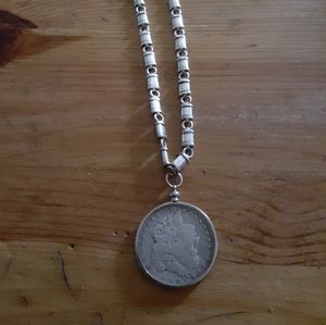1888 Morgan silver dollar pendent with rare silver